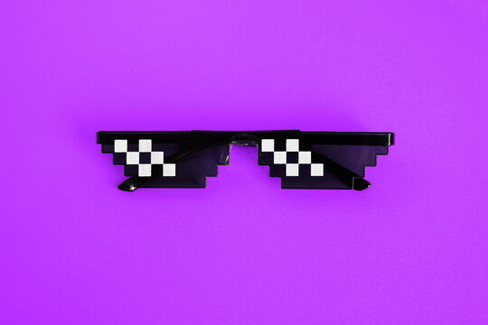 Funny pixelated boss sunglasses on purple background. Gangster, Black thug life meme glasses . Pixel 8bit style