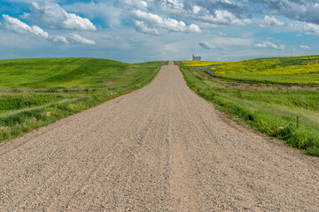 Gravel road in the country leading to the historic, yet abandoned Peace Lutheran Church in...