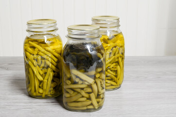 Homegrown and canned green beans with fungus growing in canning jar. Unsafe hazardous spoiled...