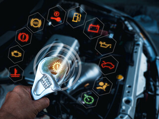 A man's hand holds a large wrench with his left hand above the engine compartment where the bonnet is opened. And there is a glowing which red ,orange and green color icon all around