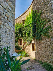 Fototapeta na wymiar Narrow street in the medieval village of Mirmande, Provence, south of France.