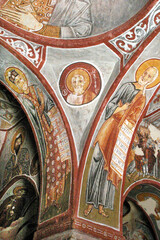 Christian frescoes at cave in Goreme District, Aksaray, Cappadocia, Turkey.