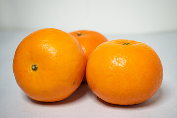 Fresh orange isolated on a white background, Mandarin orange  isolated on white background