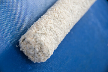 Preparing sushi with Raw salmon steak, rice and fresh avocados
