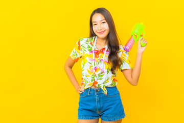 Portrait beautiful young asian woman wear colorful shirt for sonkran festival