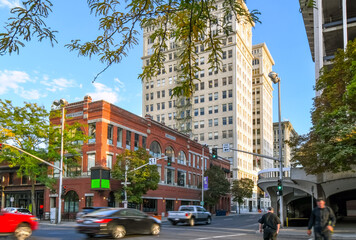 Downtown Main Street in the city center of Spokane, Washington, USA, near the 1889 Red brick...