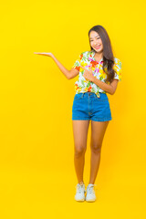 Portrait beautiful young asian woman wear colorful shirt for sonkran festival