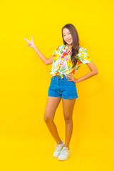 Portrait beautiful young asian woman wear colorful shirt for sonkran festival