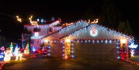 enthusiastic Christmas lights on a suburban house