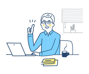 サムズアップをしているリモートワーク中の中高年男性