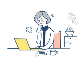 困っている表情のリモートワーク中の中高年女性
