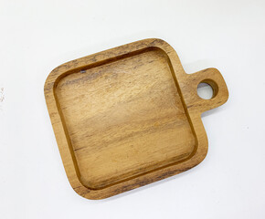 wooden saucer isolated on white background