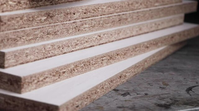 Stack of laser cut white melamine boards