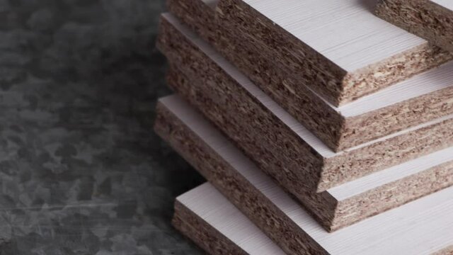 Stack of laser cut white melamine boards