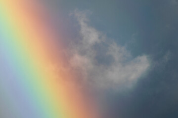 Obraz na płótnie Canvas Rainbow in rural area of Guatemala, rain and mountains in open space, natural phenomenon.