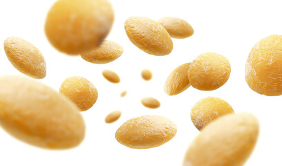 Yellow lentils levitate on a white background