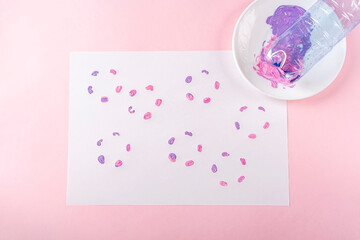 DIY and kids creativity Step by step instruction: draw greeting card with paints, plastic bottle. Step2 dipped bottles bottom in paint and put print on paper. Children Craft for womens, mothers day.