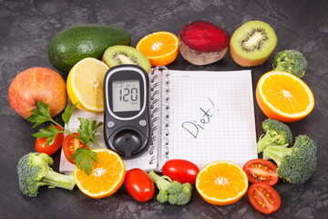 Glucose meter for checking sugar level, notepad and fruits with vegetables containing vitamins. Diabetes, slimming and diet concept