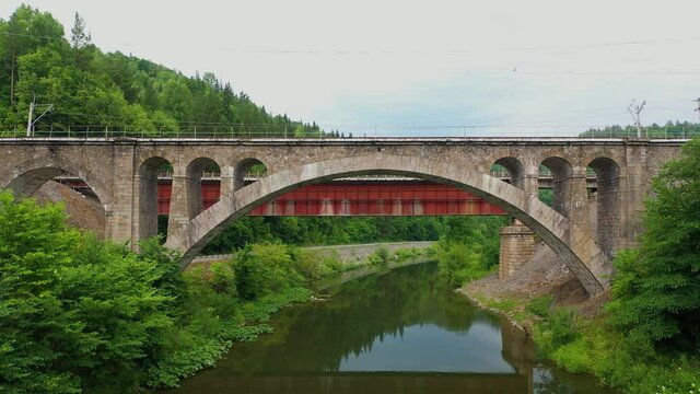 Nikolsky stone bridge over the Sim river in the Chelyabinsk region of Russia. The author of the project Belelyubsky. Aerial Video