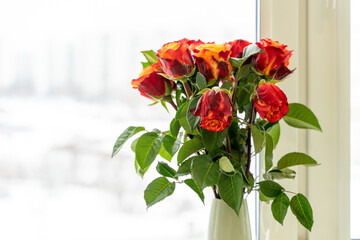 Roses are yellow and red. Beautiful bouquet of flowers.