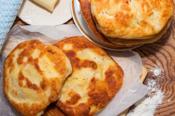 homemade cheese pies are on the kitchen table