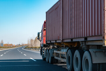 Fototapeta na wymiar Semi-trailer cargo on the highway