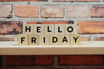 Fototapeta premium Hello Friday alphabet letter on shelves wooden background