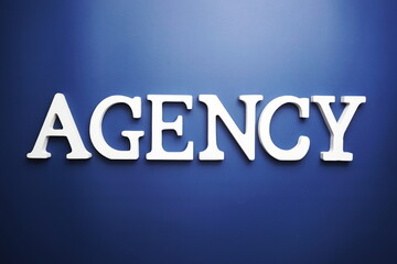 Agency alphabet letter on blue background