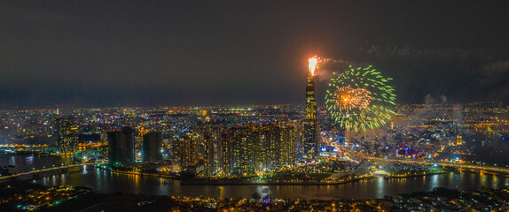 Aerial panoramic skyline view of Ho Chi Minh city and fireworks display