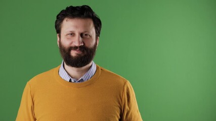 Man holding number 30 sign. Cheerful white bearded good-looking man in yellow sweater shows number thirty on white sheet. Chrome key, green screen, copy space - Powered by Adobe