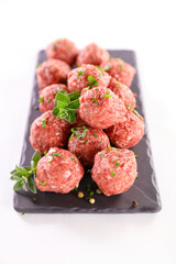 raw meatball isolated on white background