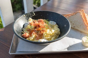 Scrambled eggs with salmon and chives