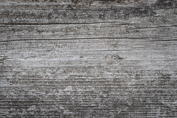 Weathered wooden textured cracked gray background
