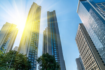 Fototapeta premium Looking up at the commercial buildings in downtown Guangzhou, China