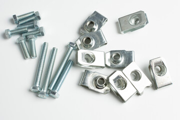 technological background of metal bolts and nuts close up