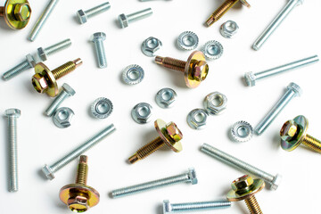 technological background of metal bolts and nuts close up