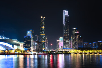 Fototapeta na wymiar Night view of modern buildings in Guangzhou Pearl River Financial Center