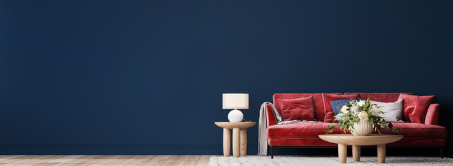 Living room interior mock-up with red sofa, wooden table and rattan home decoration in dark blue background, panorama, 3d render © lilasgh
