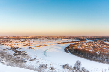 Crown. View from the hill. Winter landscape. The Klyazma River.
