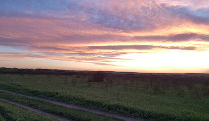 very beautiful sunset over the field
