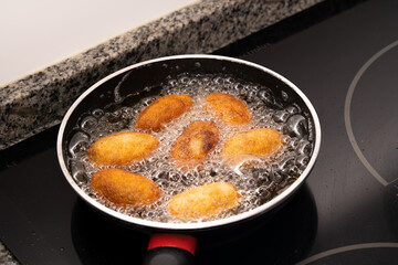 Close up fried croquettes. Homemade cooking concept.
