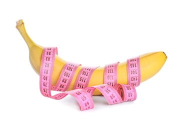 Ripe banana and measuring tape on white background. Weight loss concept