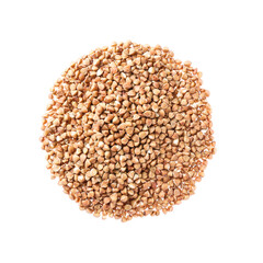 Heap of raw buckwheat on white background