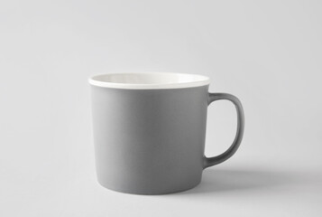 Empty cup on light background