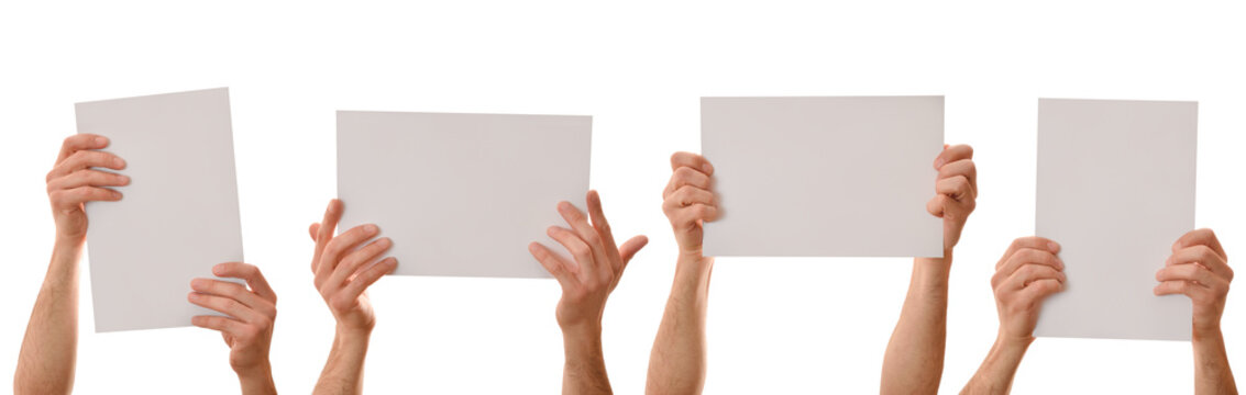 Set of four A4 sheets holding with both hands isolated