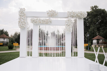 beautiful arch for wedding ceremony in the park