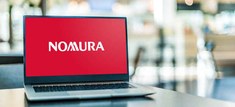 Laptop Computer Displaying Logo Of Nomura Holdings