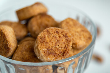 Homemade cookies are in a bowl. Close-up