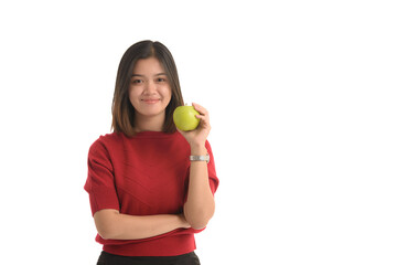 Asian woman is holding an apple with her left hand and look interesting on white background.