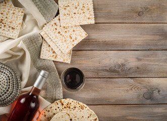 Passover holiday traditional celebration with cup wine kosher matzah unleavened bread on of Jewish Pesach.